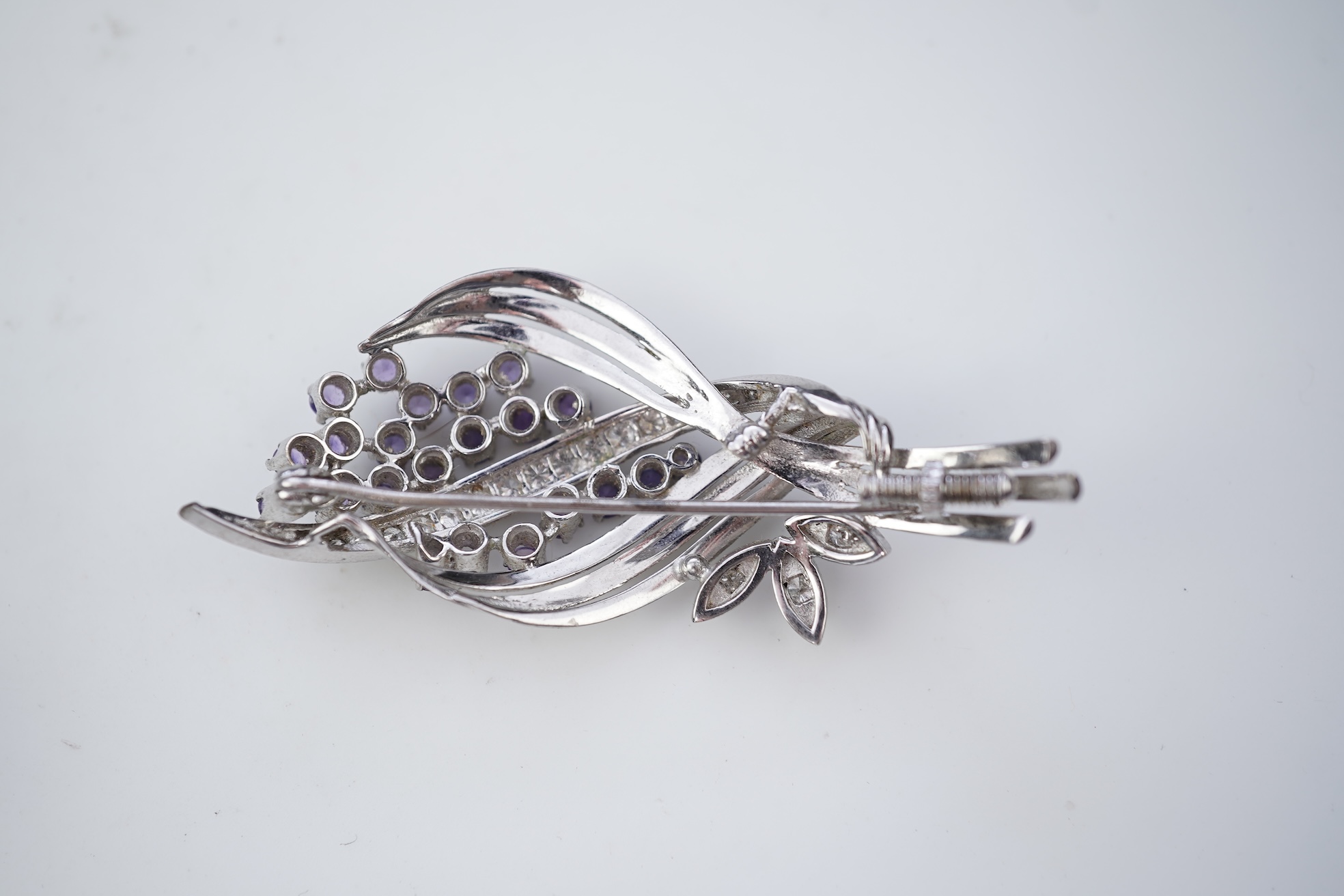 Three rings and a brooch